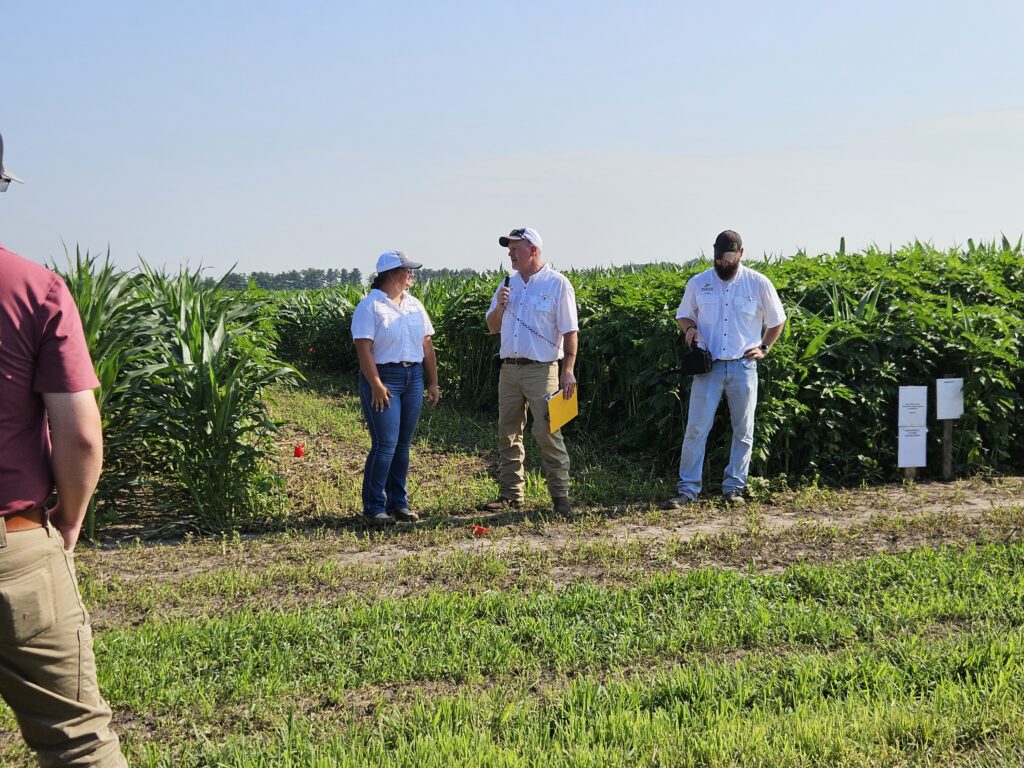 Speakers at a weed science field day.