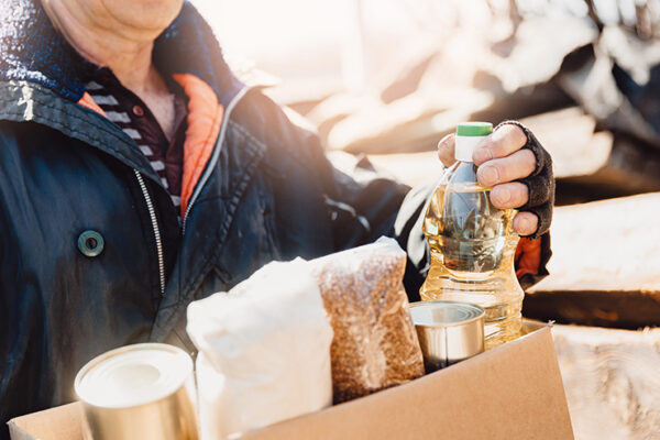 Man holding box of food