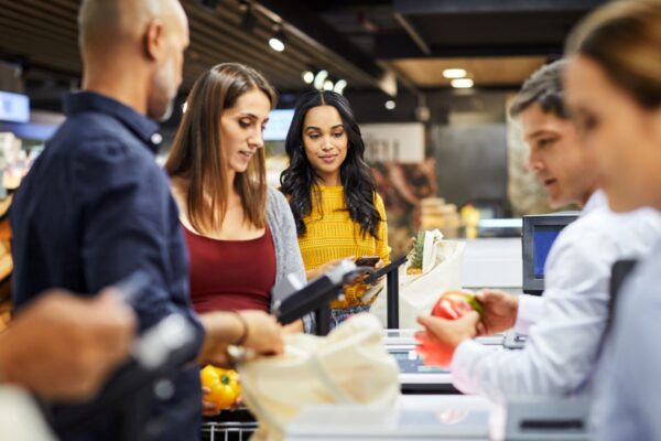 Customers in line at a grocery store checkout