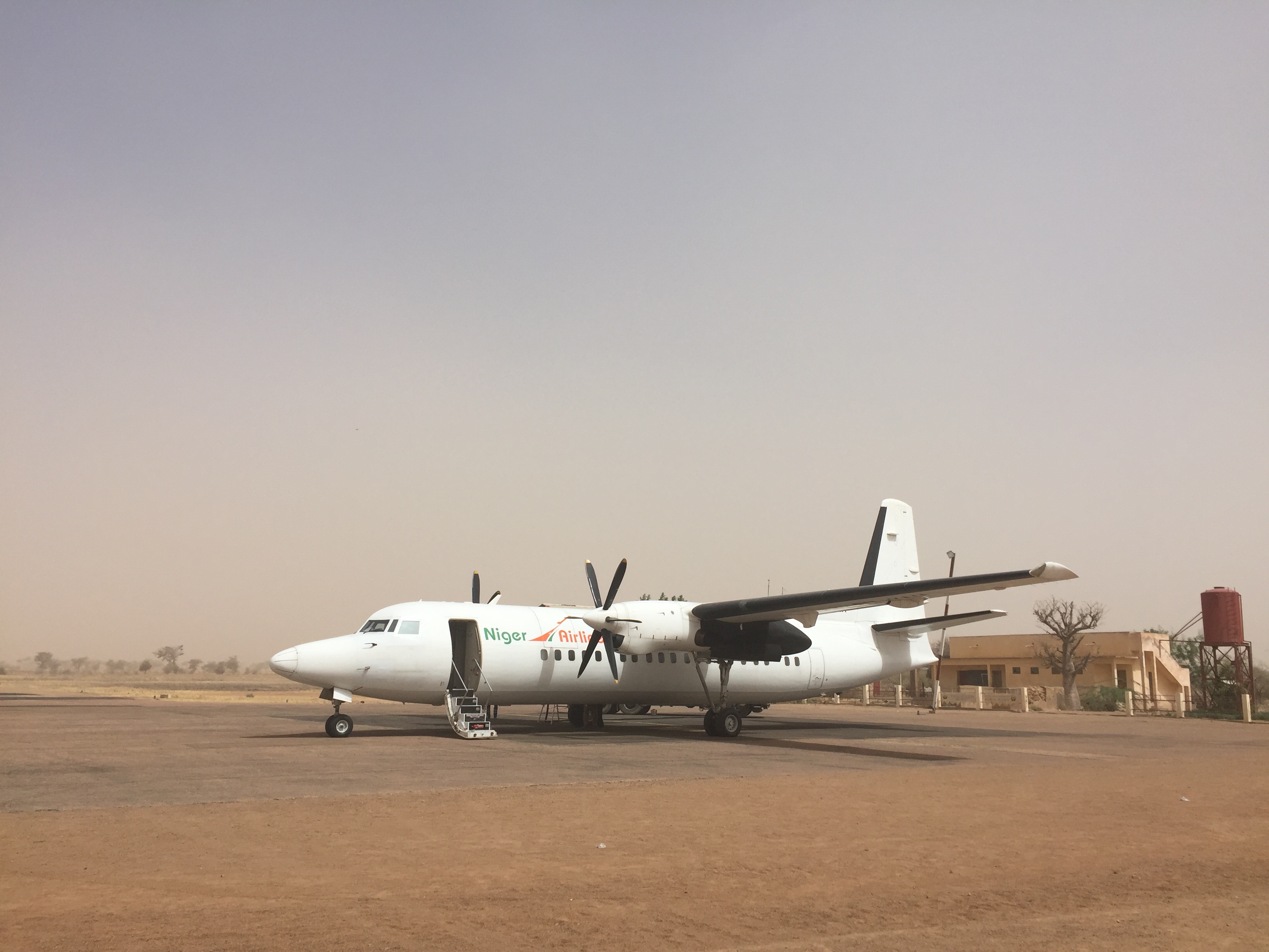 Kabir boarded a 30-year-old Fokker 50 propeller plane in Niamey with the goal of reaching Maradi in the agricultural belt of Niger. Dust storms thwarted this plan. 