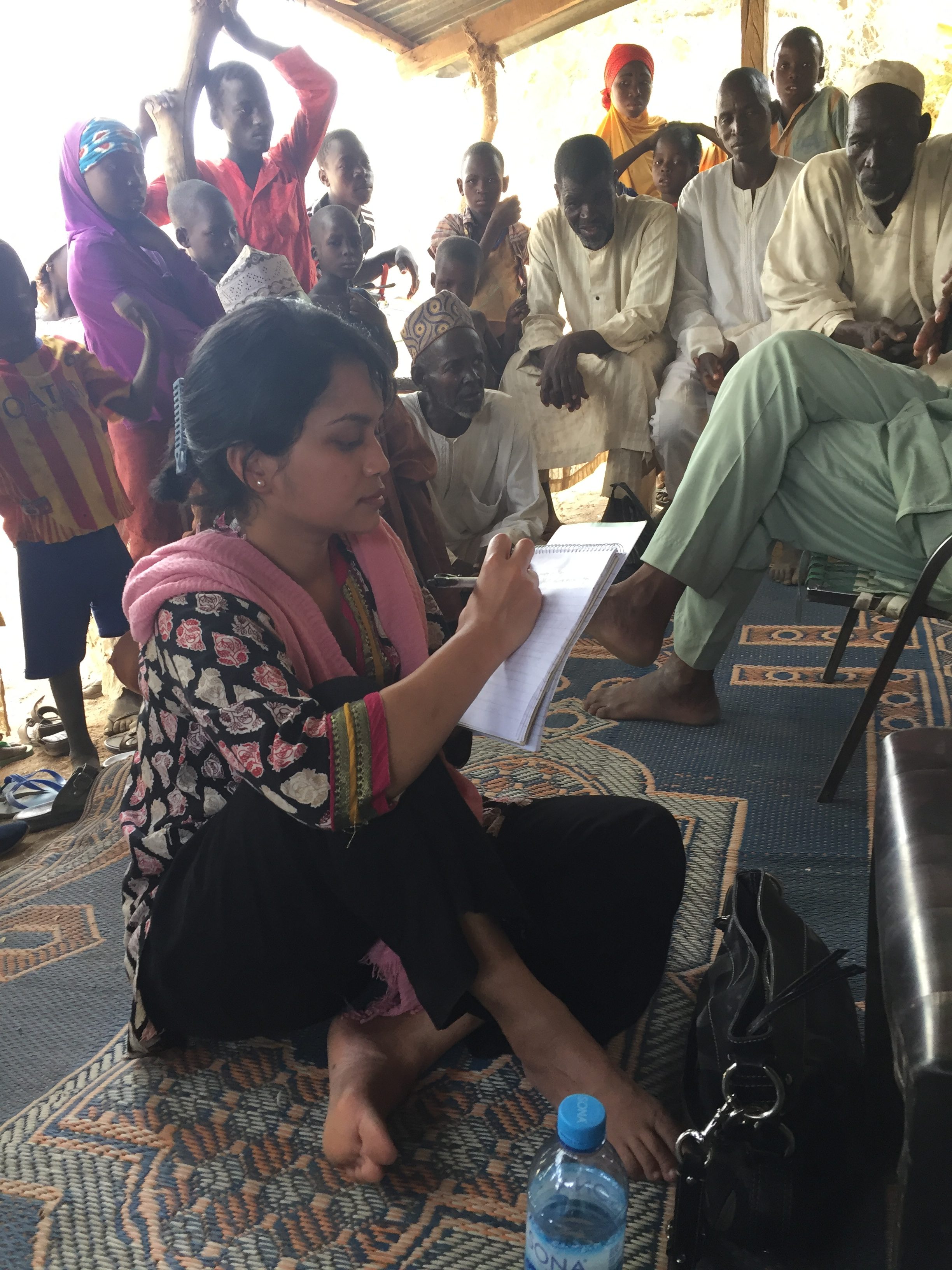 Kabir interviewing farmers about climate change.