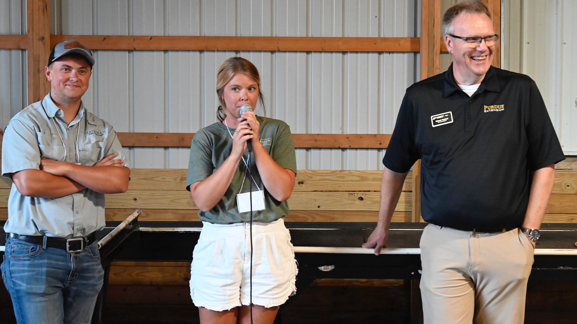 Victor Hackman, Megan VanLiew, and Michael Langemeier during the Hackman Farms visit at the Purdue Farm Management Tour.
