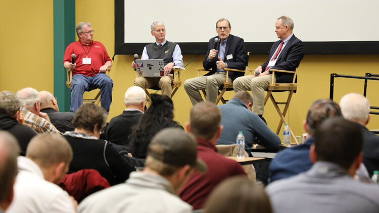 Panel discussion with Chad Hart, James Mintert, Scott Irwin, and Brad Lubben during the Purdue Top Farmer Conference in January 2024.
