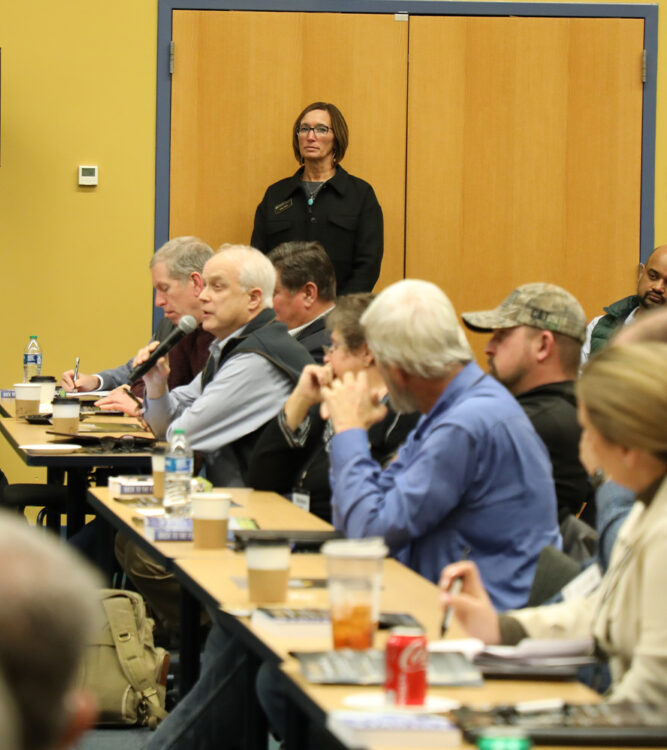 Taking audience question during the Purdue Top Farmer Conference in January 2024 in West Lafayette, Indiana.