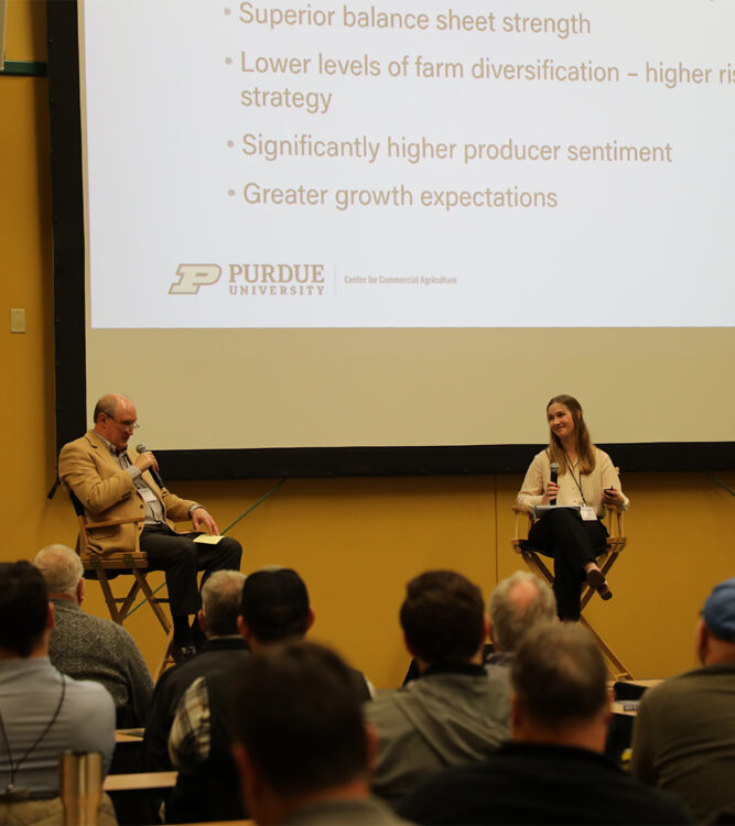 Michael Langemeier and Margaret Lippsmeyer presenting at the Purdue Top Farmer Conference in January 2024.
