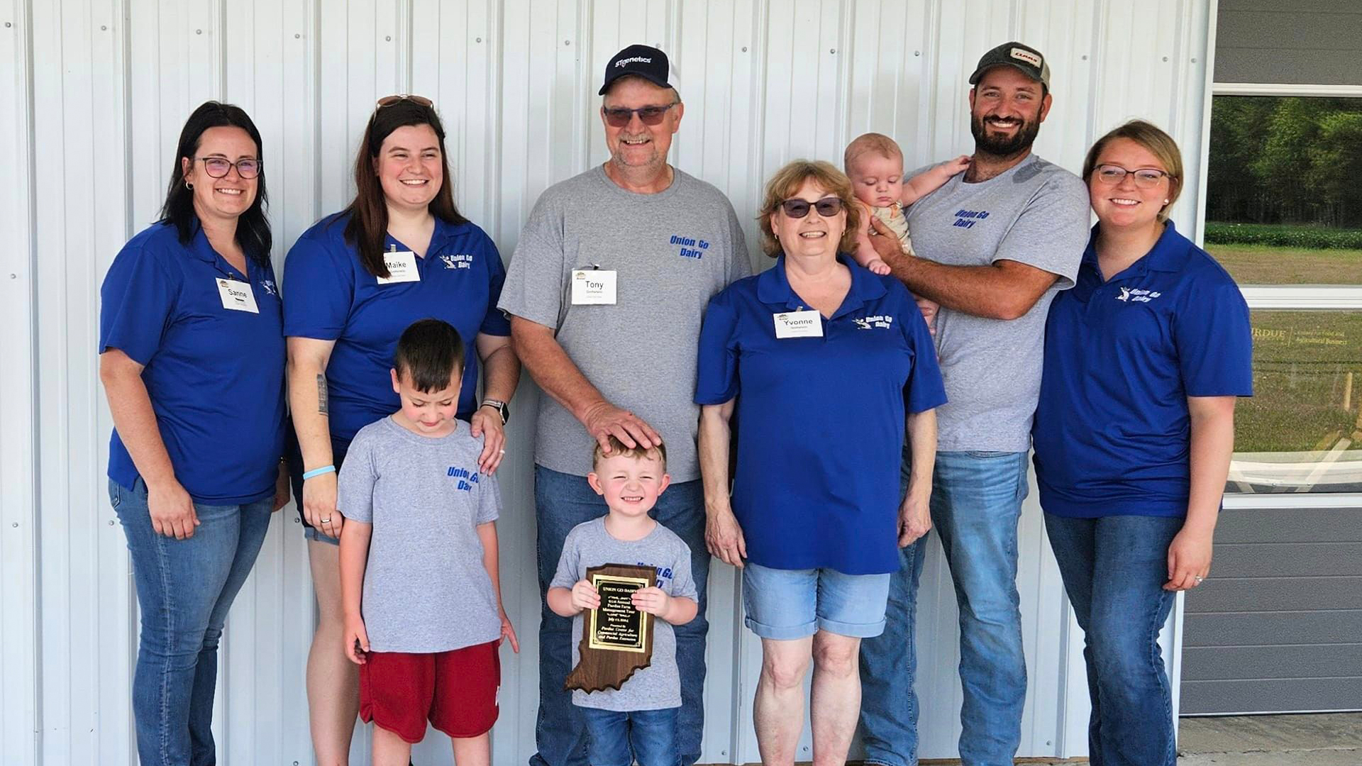 Family photo of Tony and Ivonne Goltstein with their children Sanne, Maike, Rob, and daughter-in-law Angelica and grandchildren during the Purdue Farm Management Tour on July 17, 2024.