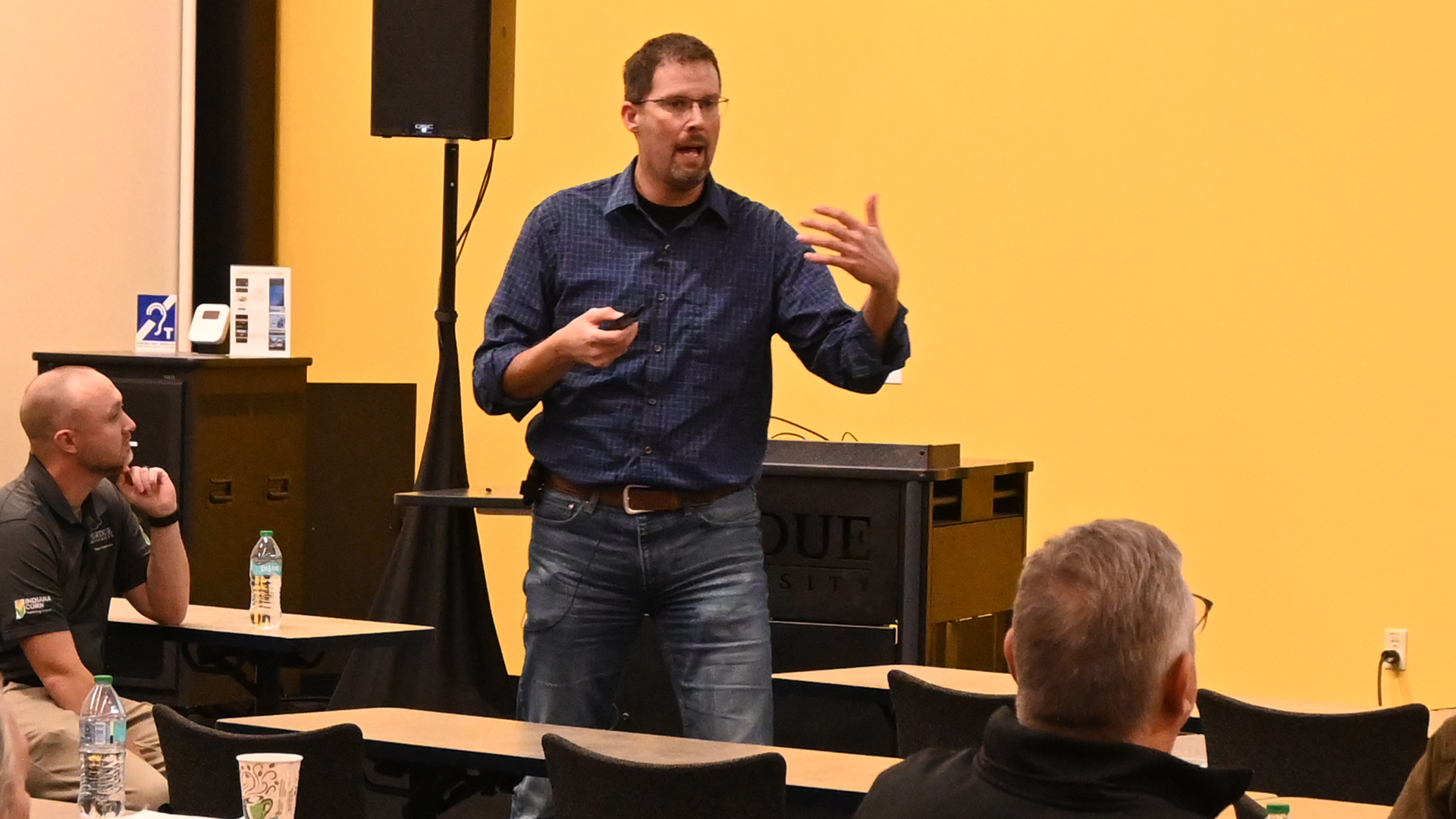 Shaun Casteel gave ways to cut costs raising soybeans with agronomic insights from his research.