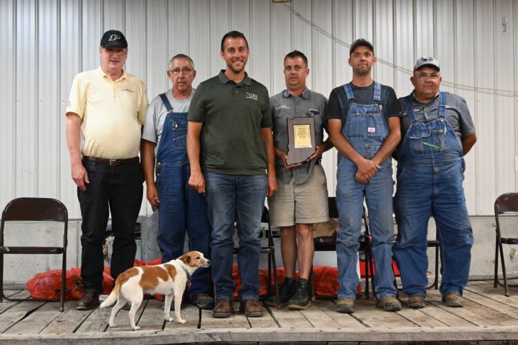 Purdue's Michael Langemeier with Robert, Chris, Casey, Logan, and Mark Jones during the Purdue Farm Management Tour
