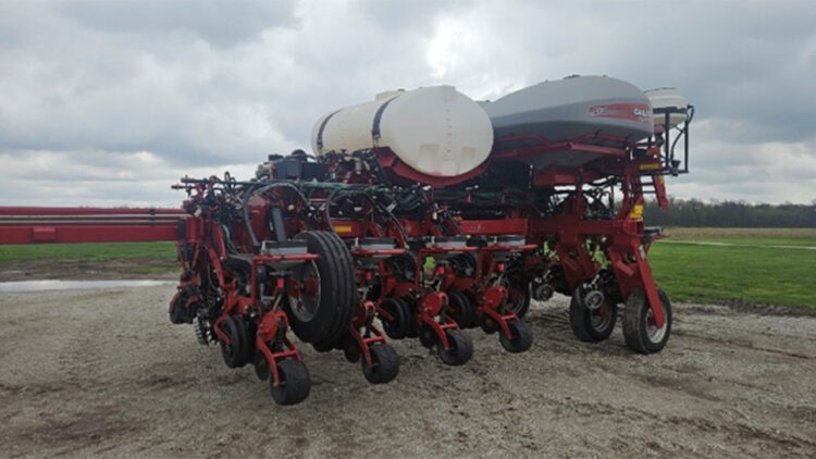 Figure 1a. A 12-row Case 2150 planter with vacuum meters, active hydraulic downforce, and row cleaners.