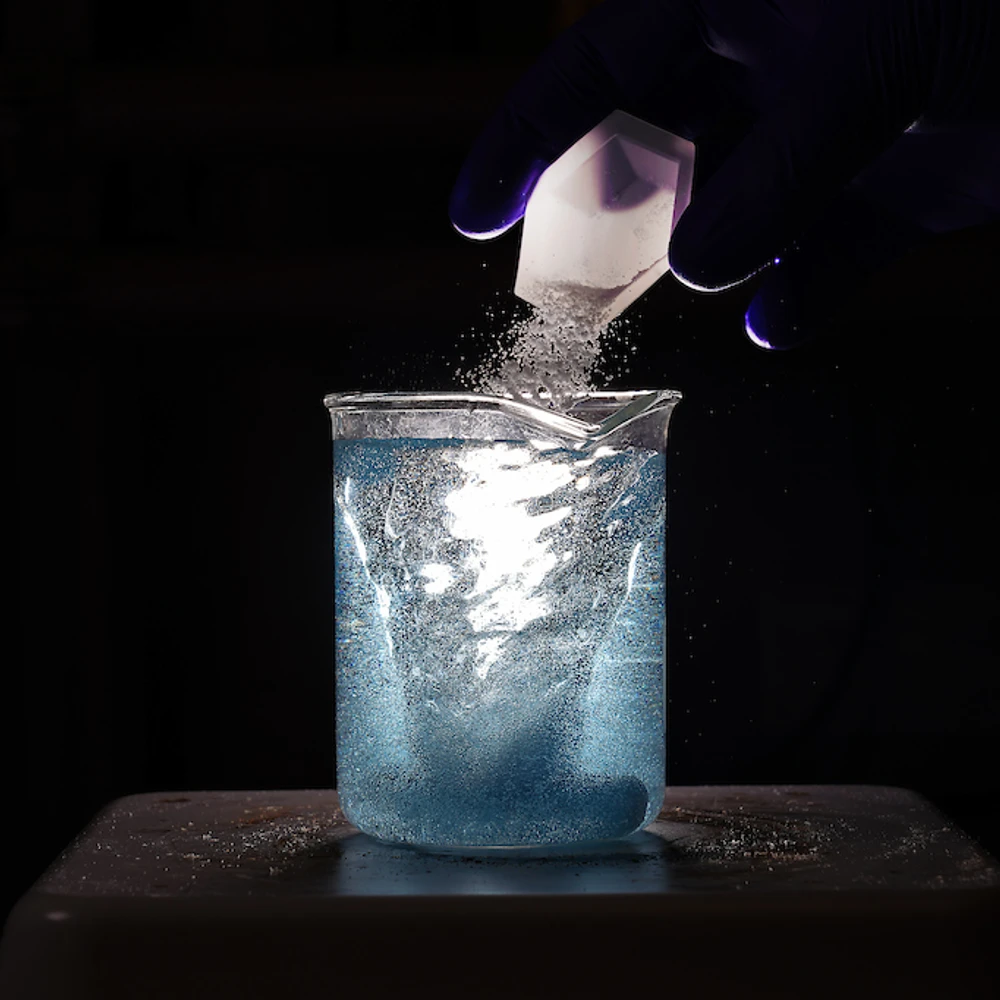 mixing material in liquid vial