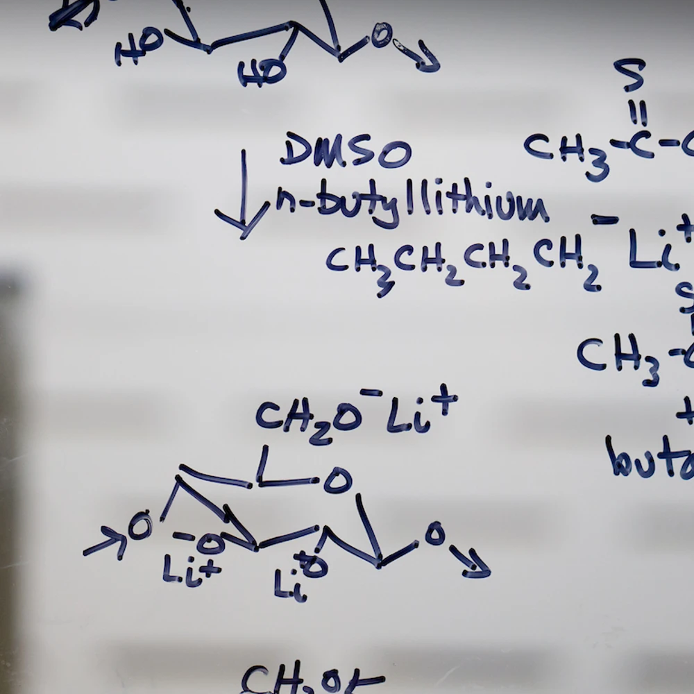 chemical compound written on clear white board