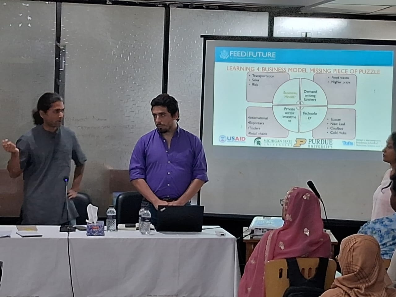 Lorenzo Alegria presenting with a colleague
