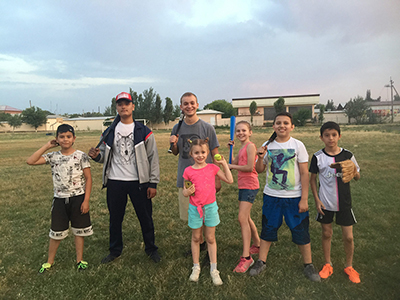 cole pearson with local children