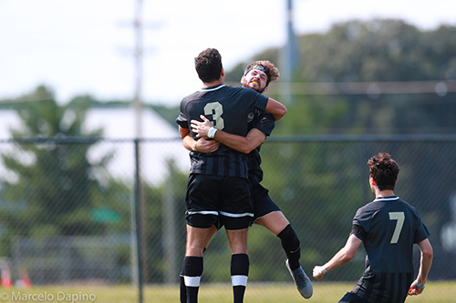 kiep and team mate celebrating