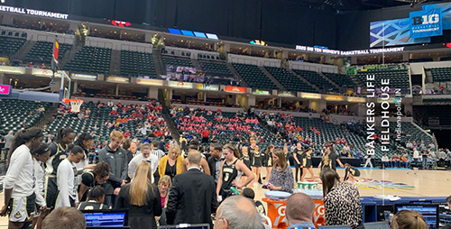 athletes on sideline at bankers fieldhouse
