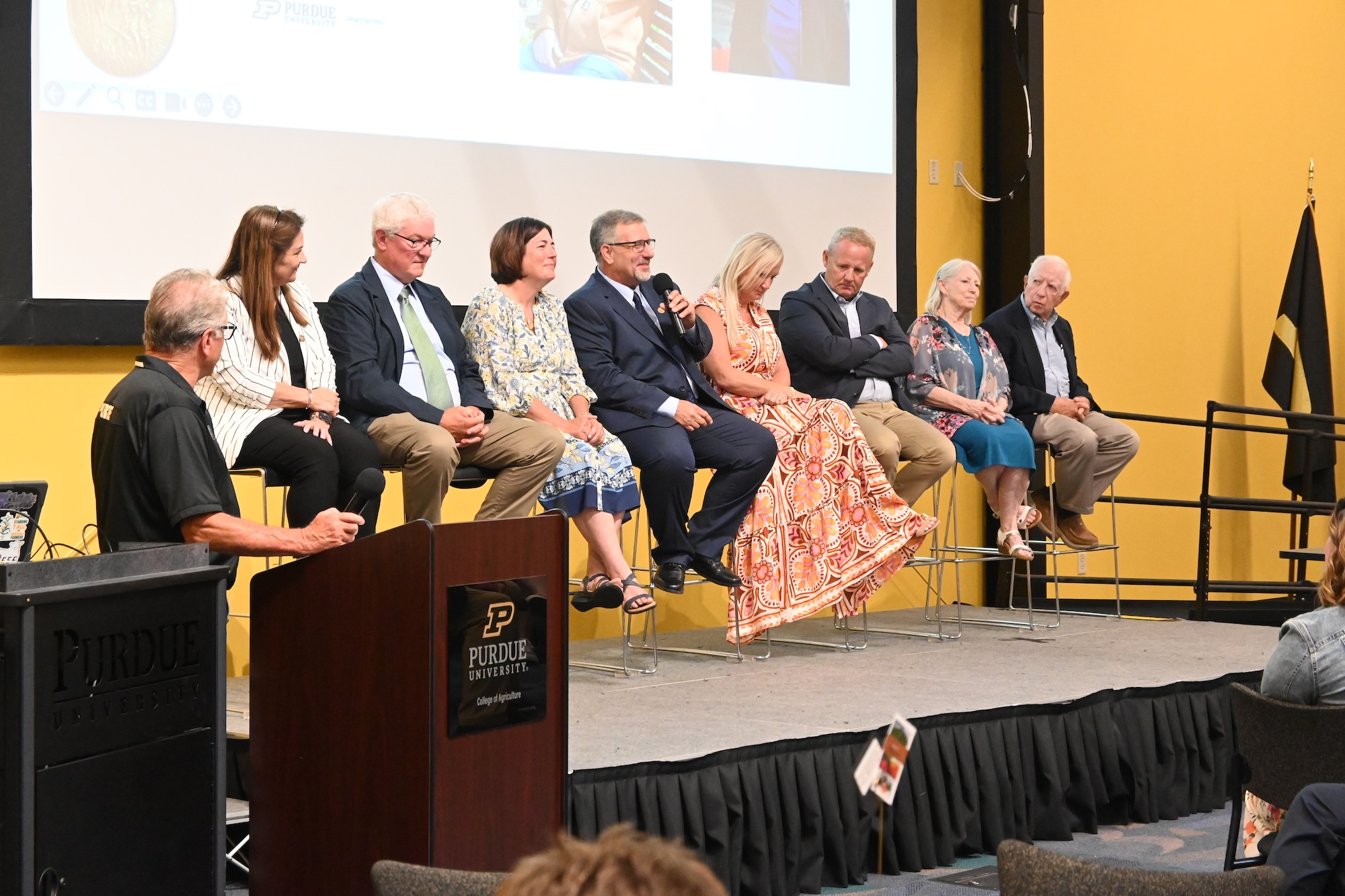 2026 Master Farmer awardees sitting on stage for a panel session