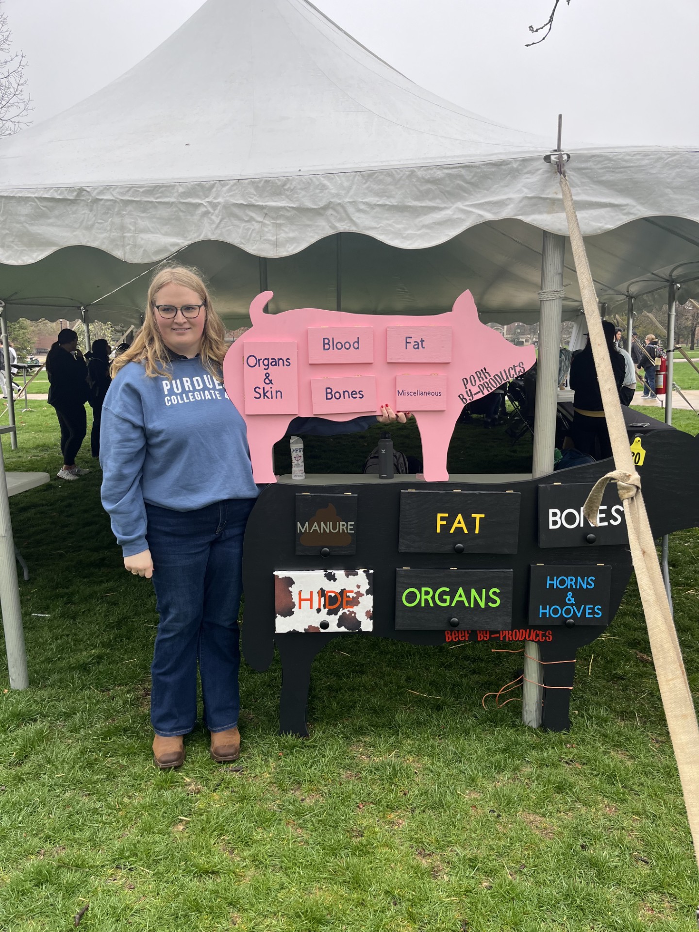 Kylie Bedel at a pork display 