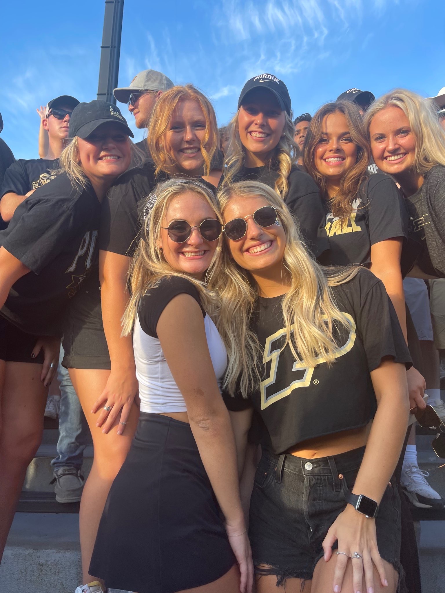 Shay with friends at a Purdue game