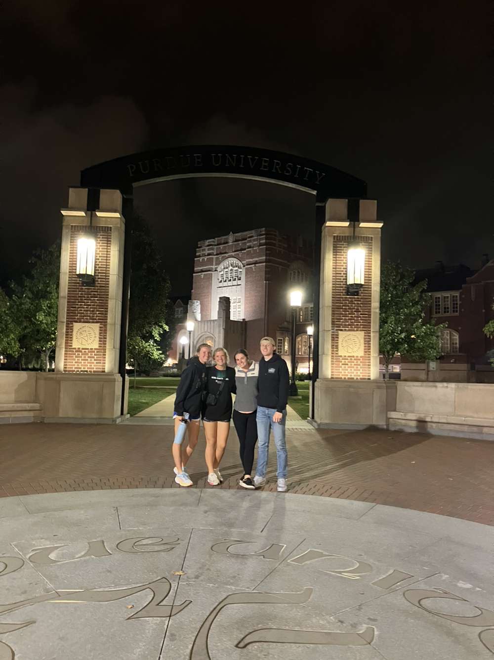 Elle with friends on campus