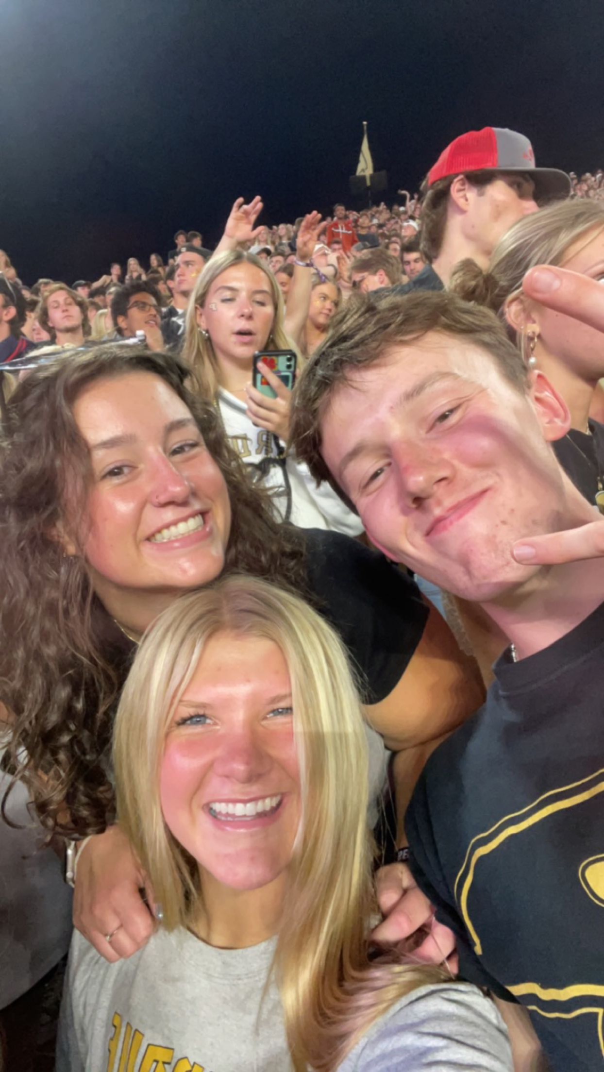 Elle with friends at a game