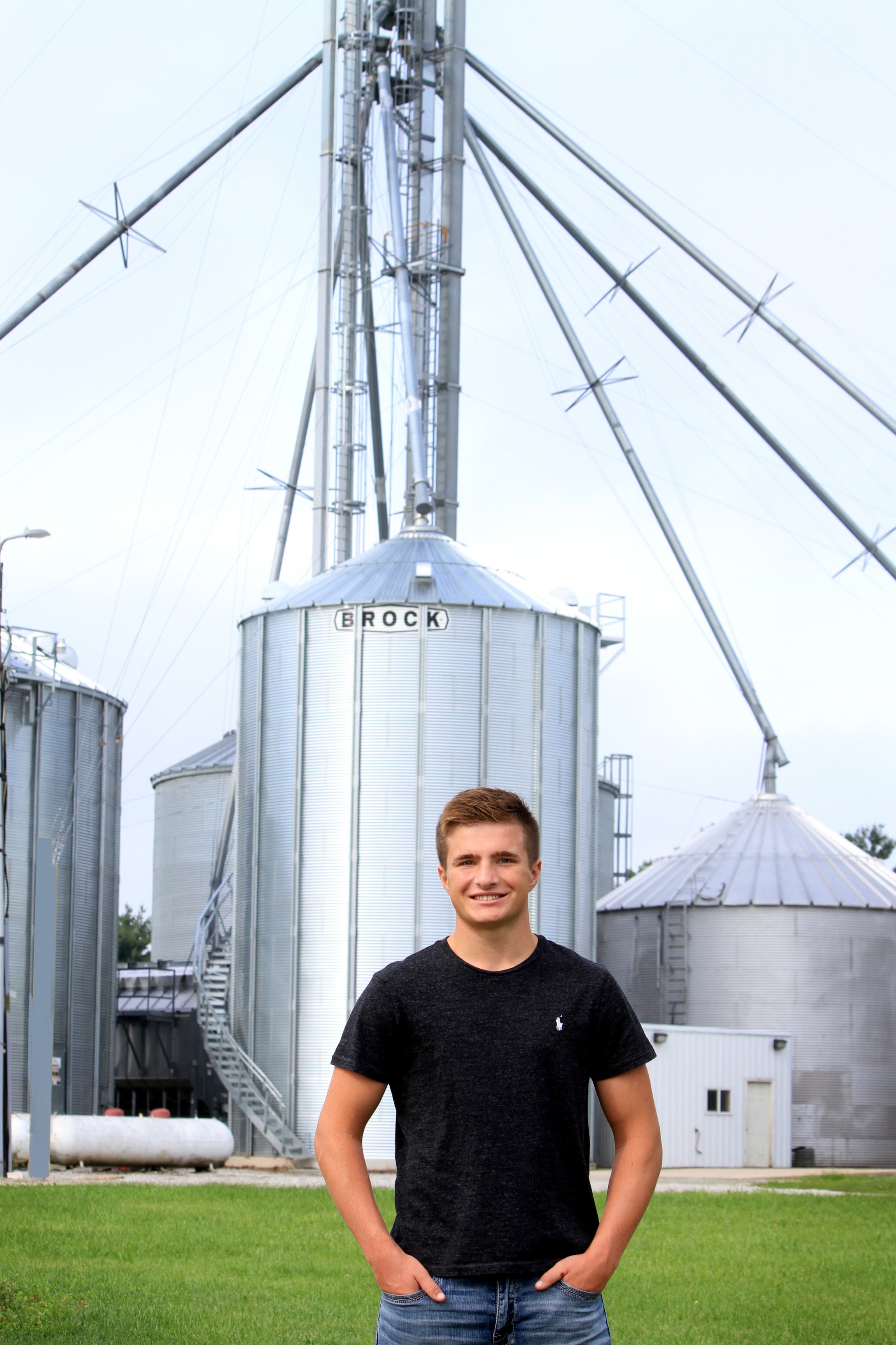 Whitesel in front of silo