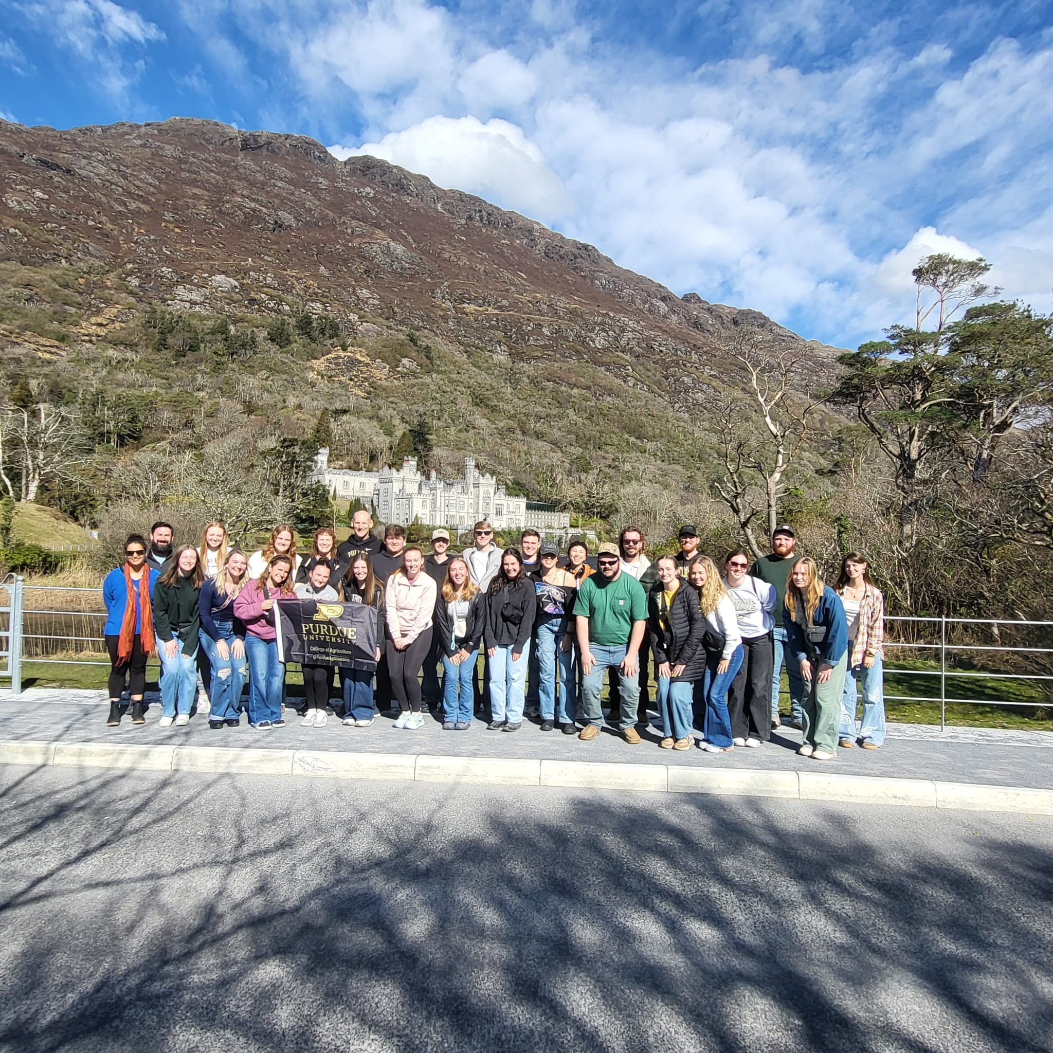 Alberring with study abroad group in front of Ireland landscape