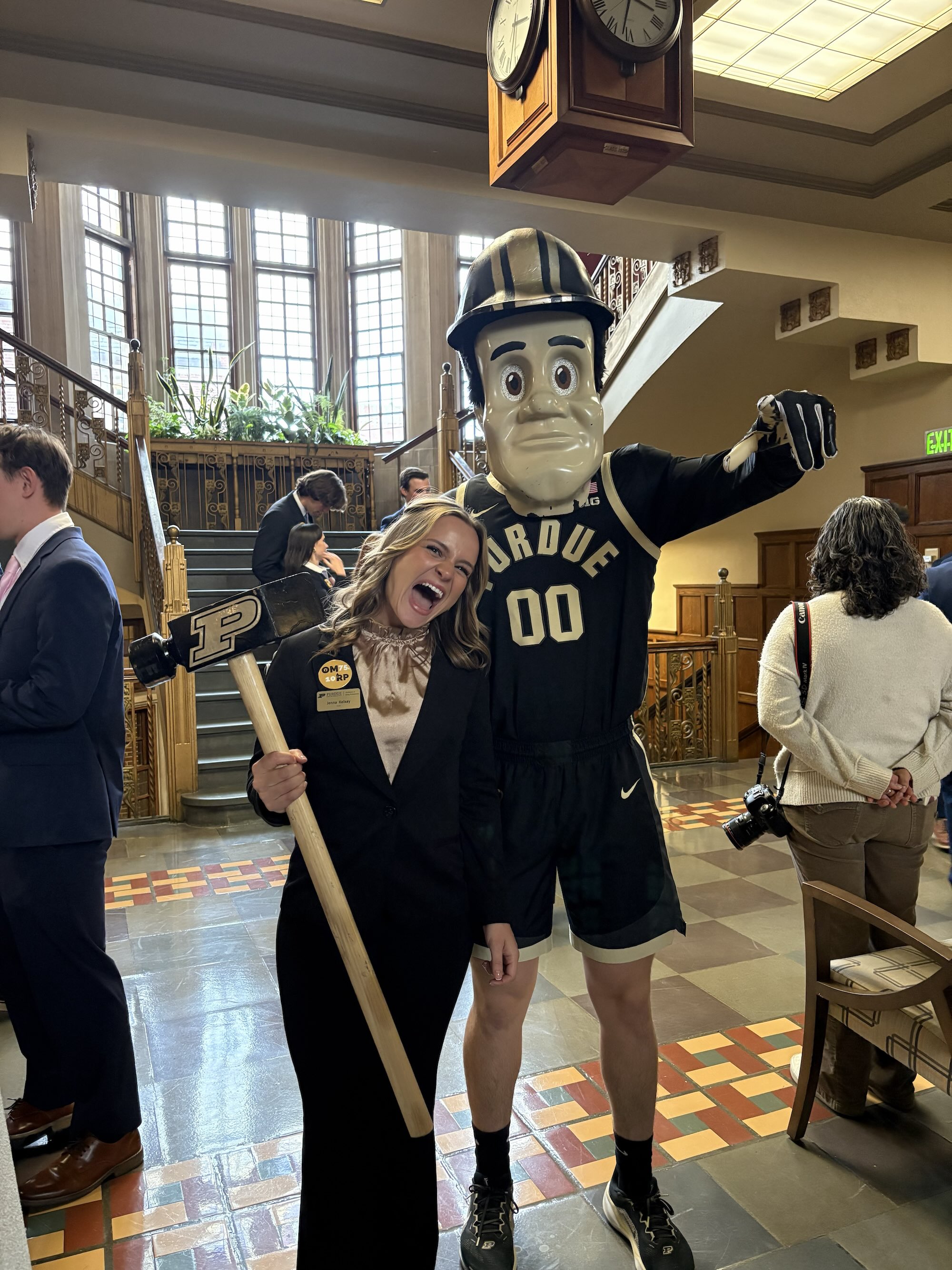 Kelsay standing next to Purdue Pete