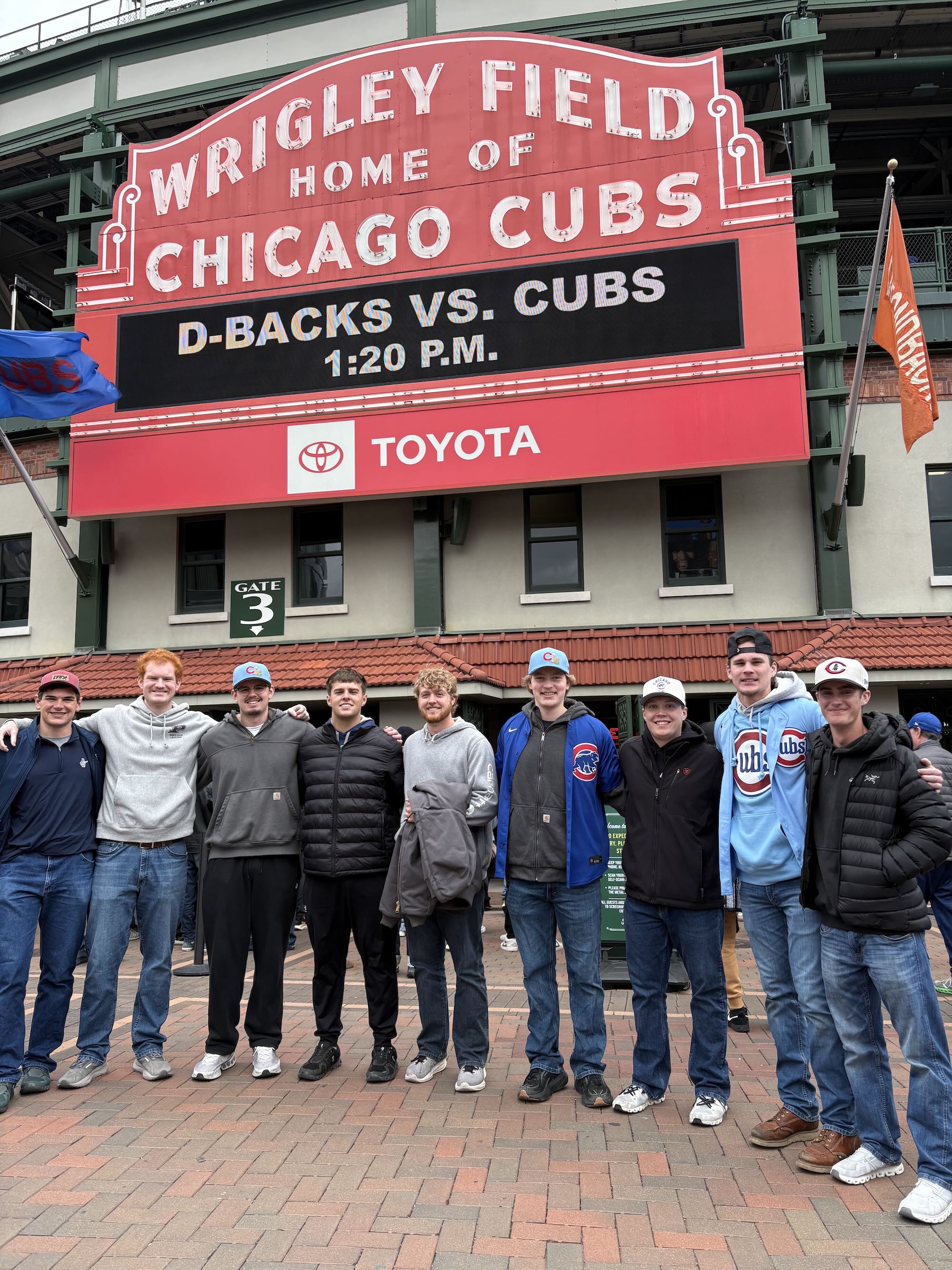 Quale with friends in front of Wrigley Field