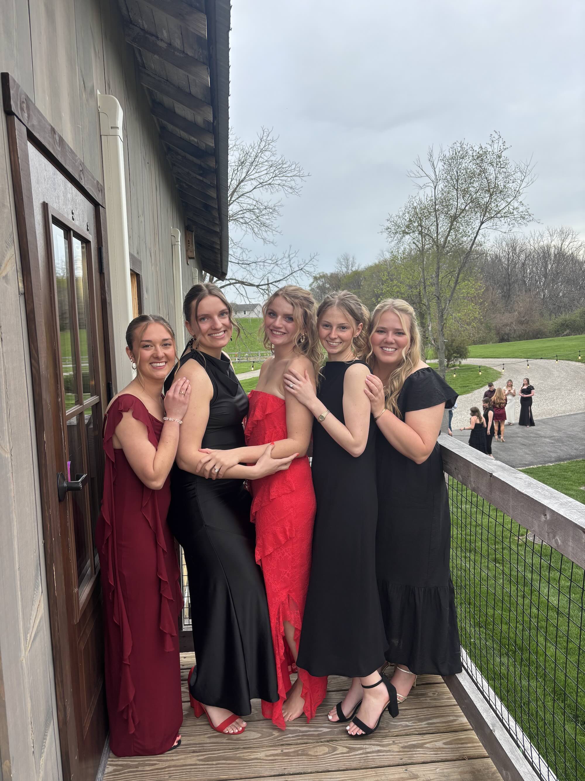 Roberts with friends in formal dance wear