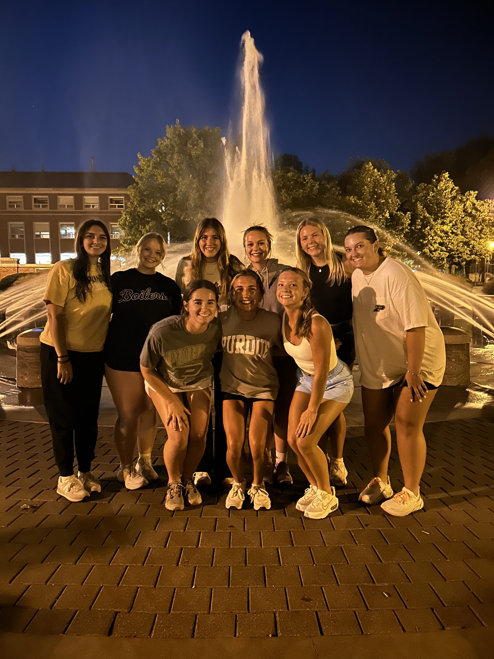 Saathoff with friends in front of fountain
