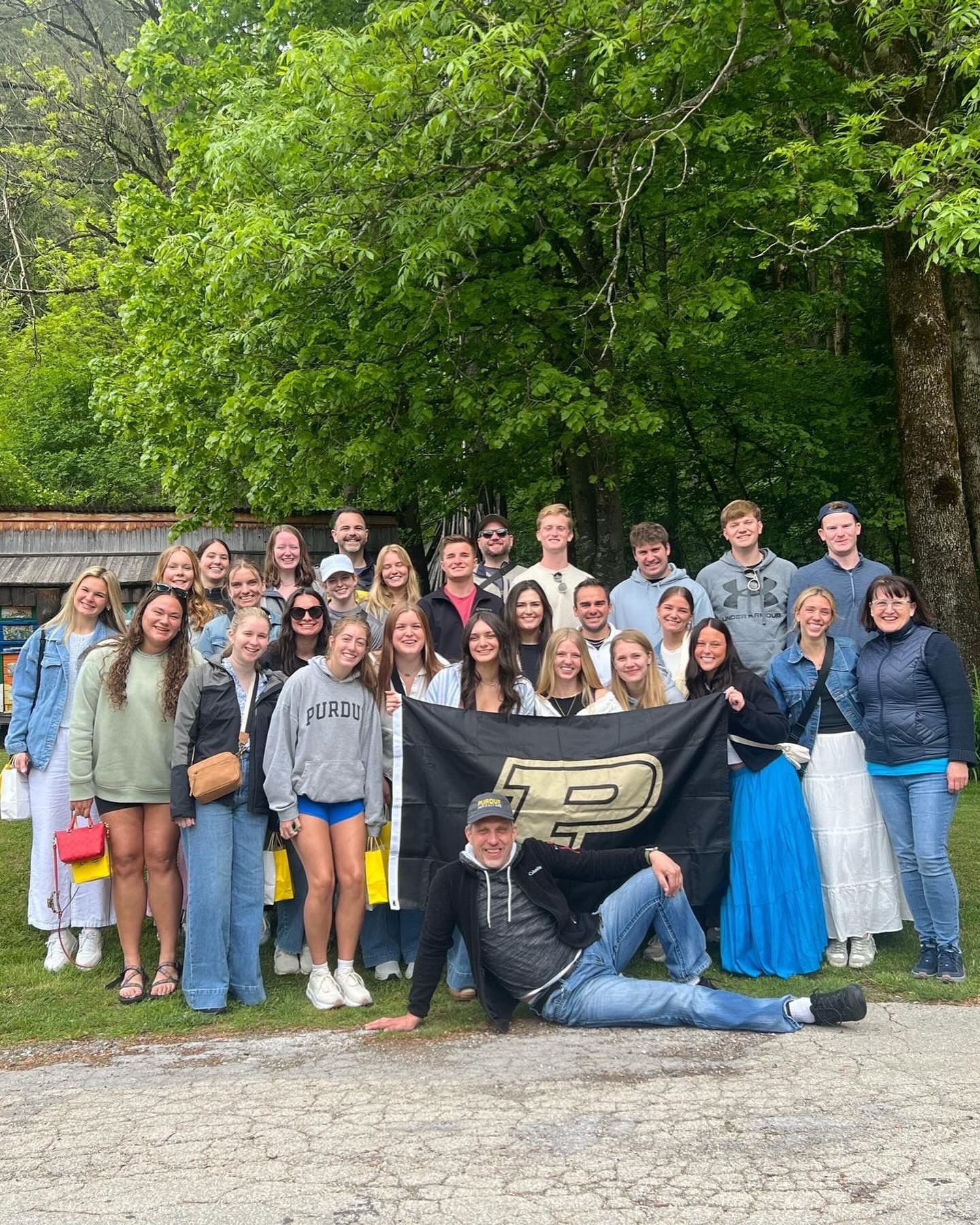 Sheward posing with study abroad group