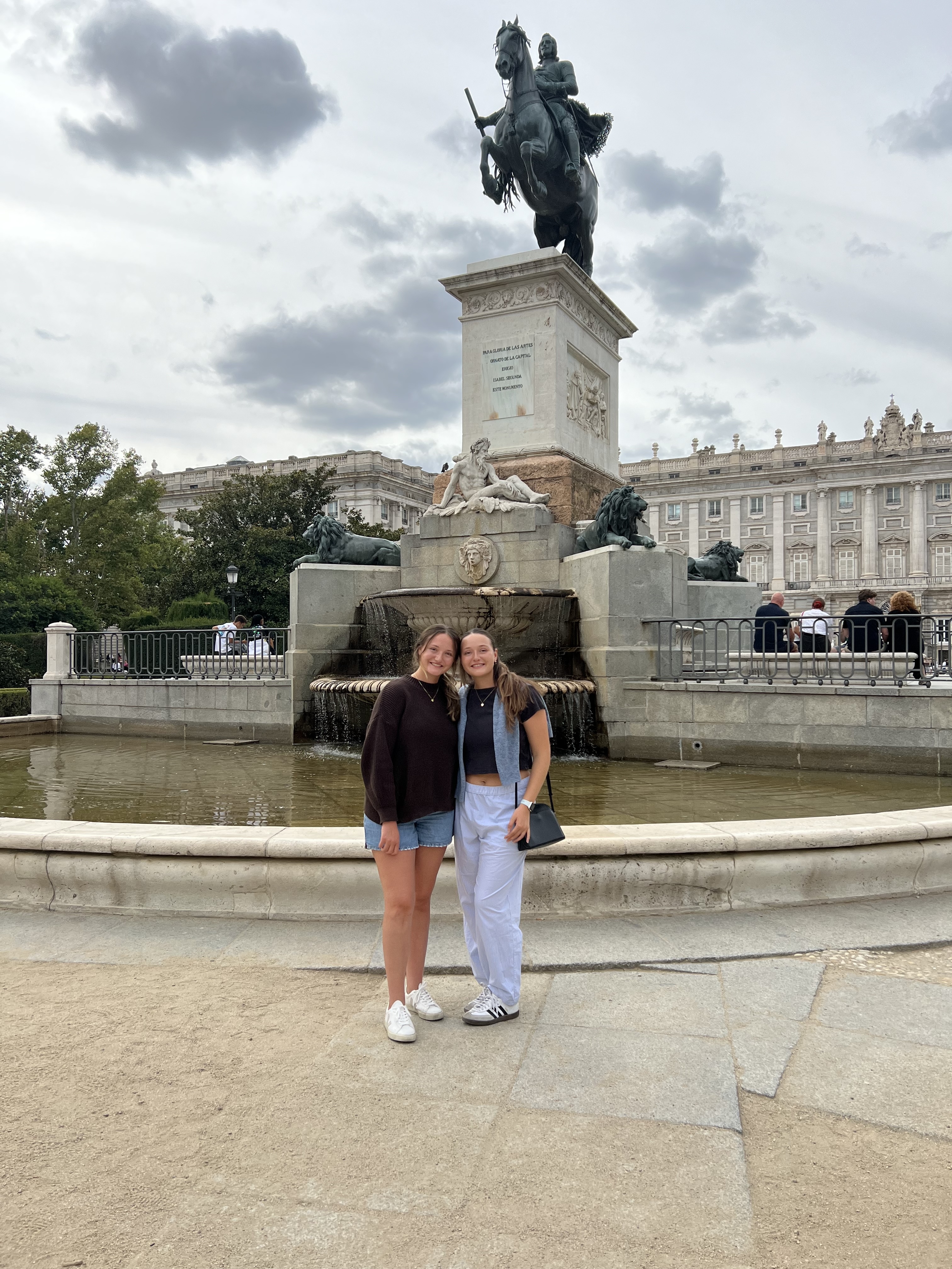 Karie and Katie in front of royal palace in Madrid, Spain