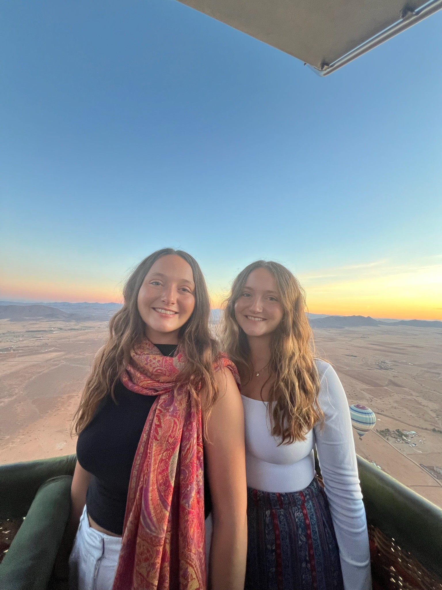 Katie and Karie on hot air balloon in Morocco