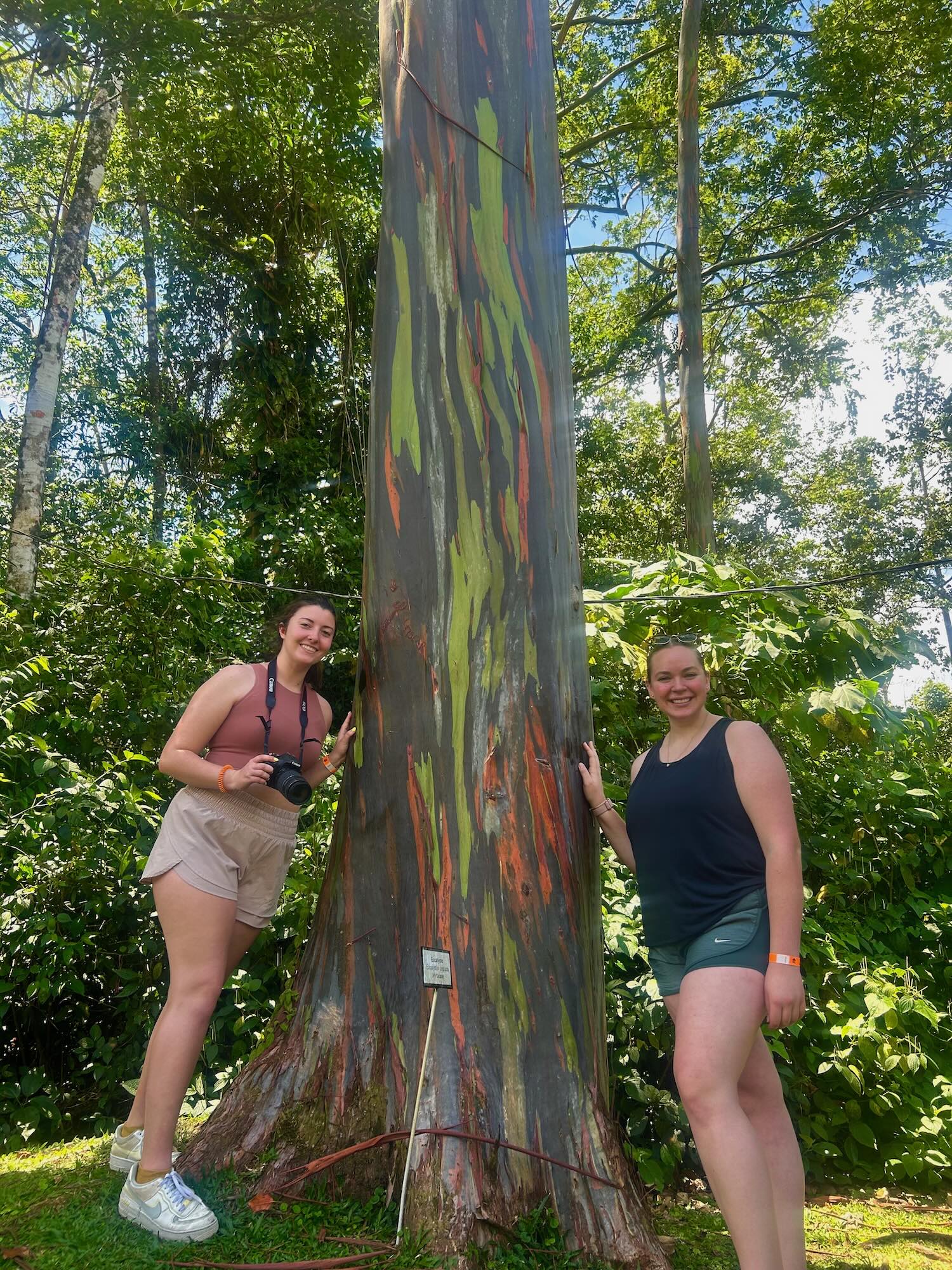 Livingston and friend in front of a tree