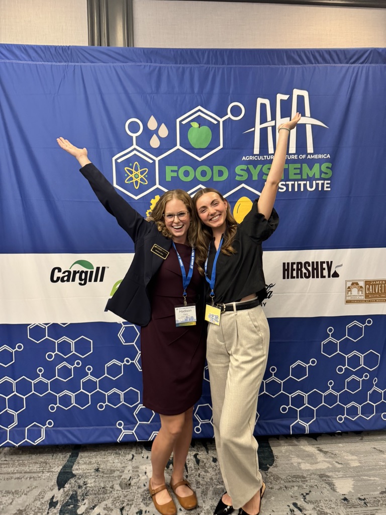 Madison Clary in front of AFA Sign