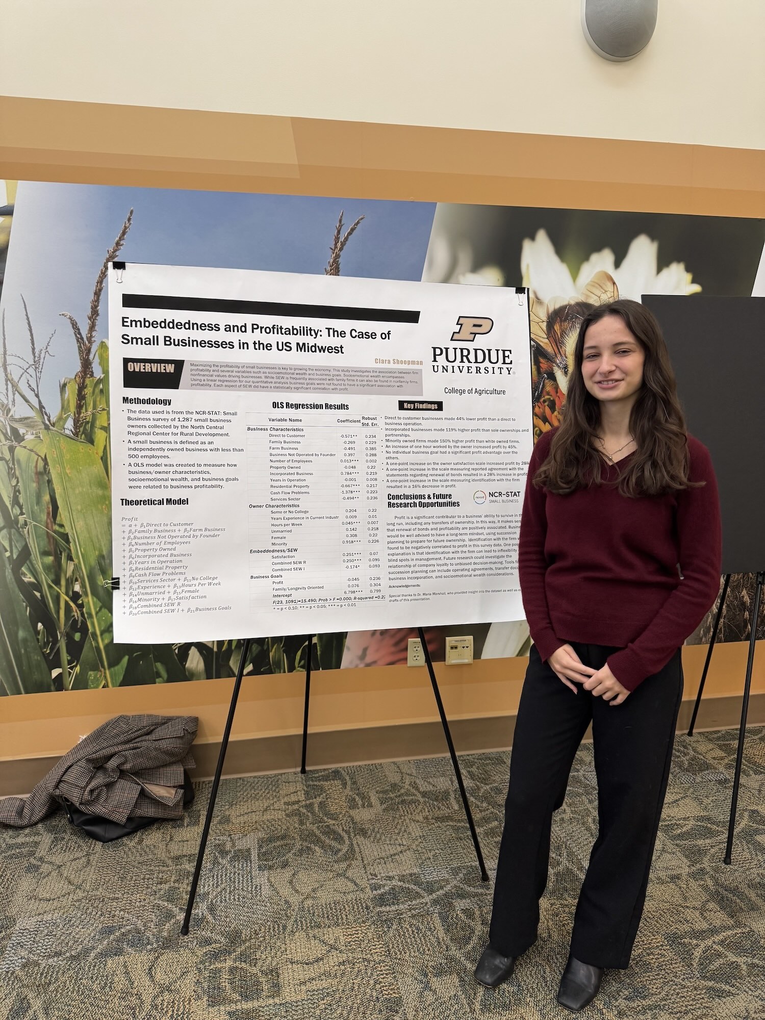 Clara Shoopman at the PCARET conference with his research poster