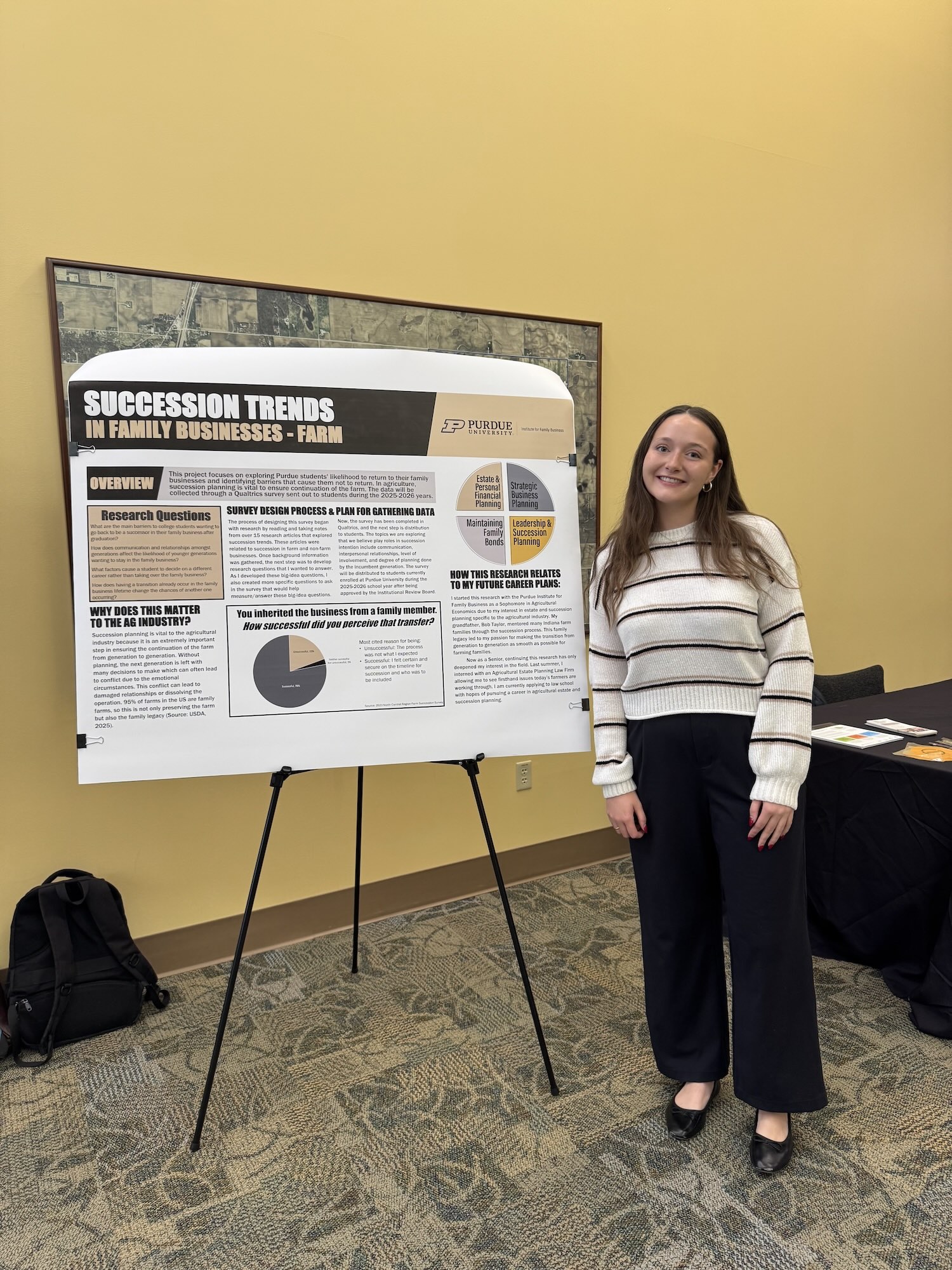 Karie Taylor at the PCARET conference with his research poster