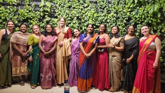 Bothwell adorned in traditional attire with travelers