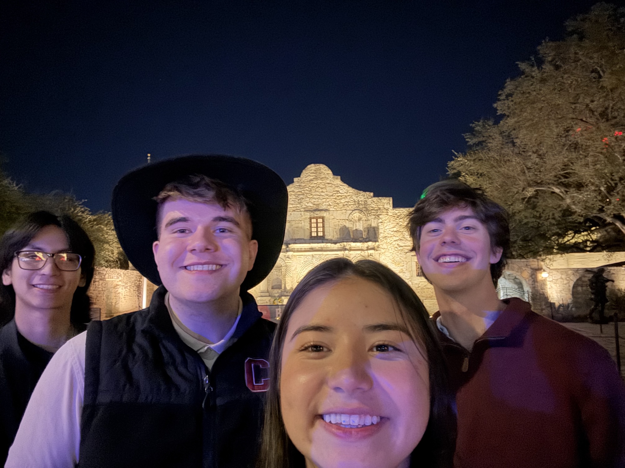  Kenny Yamauchi standing with friends in front of the Alamo