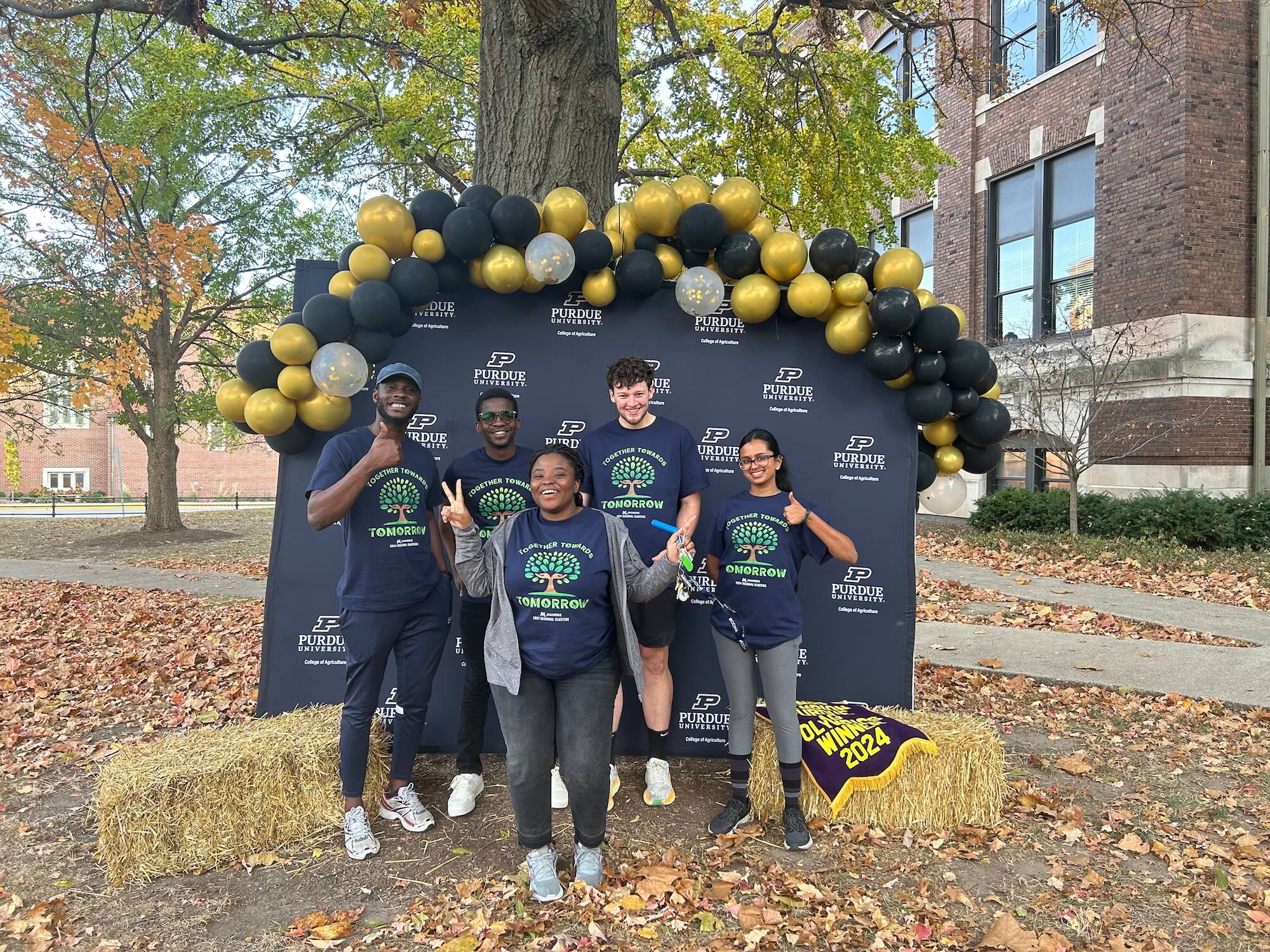 Purdue MANRRS student activity team in front of College of Agriculture background