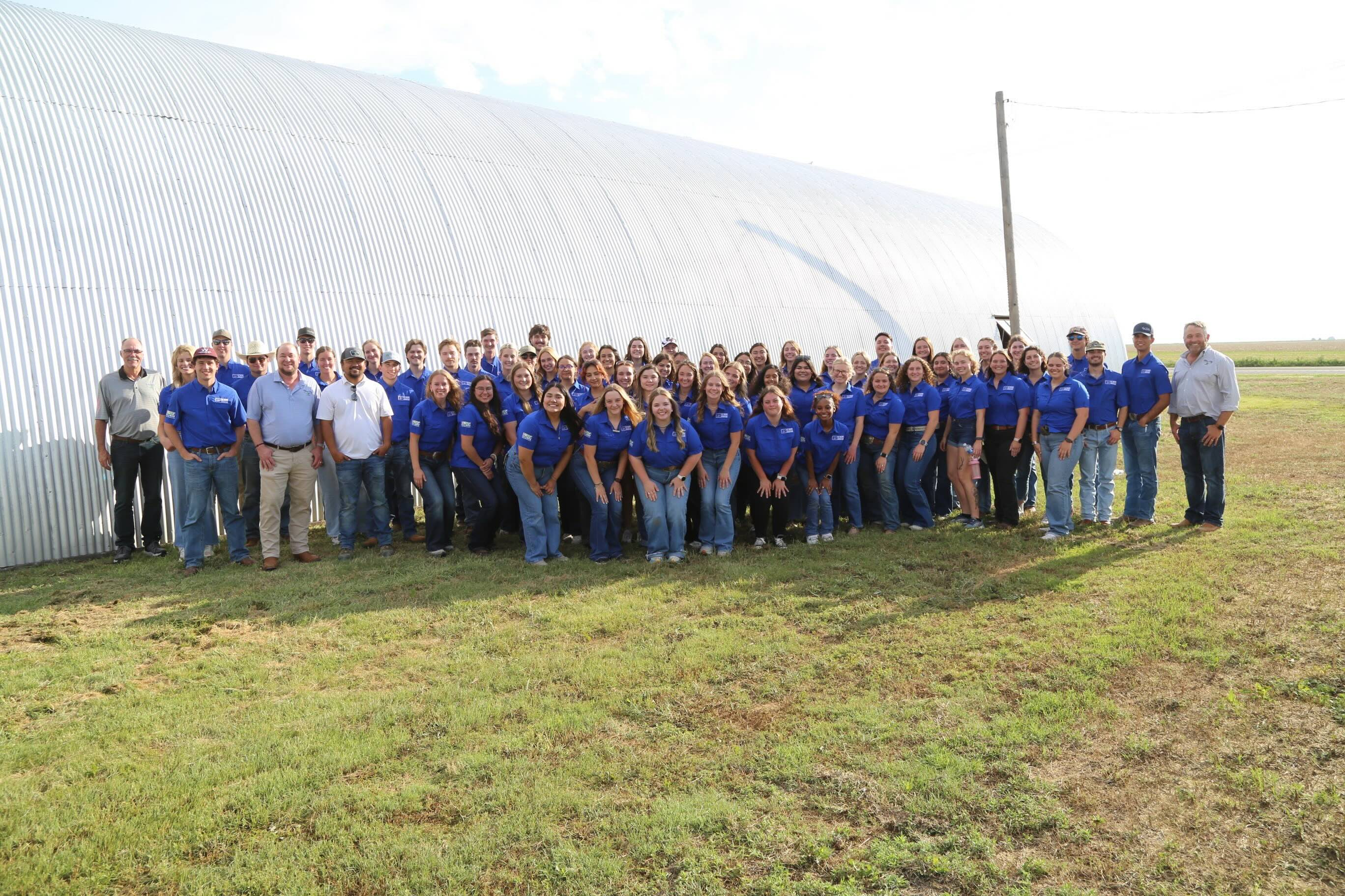 Alaina with a farm visiting group