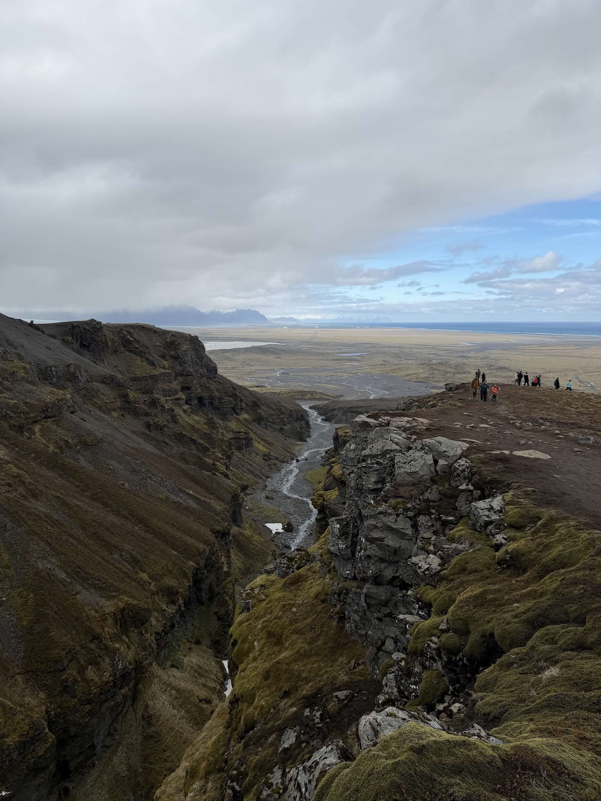 Scenic photo of landscape in Iceland showing a river and some mountains