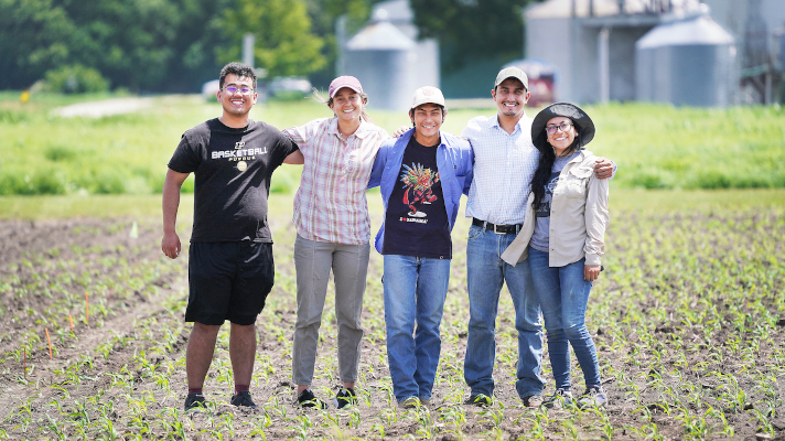 group of students in an agricultural field