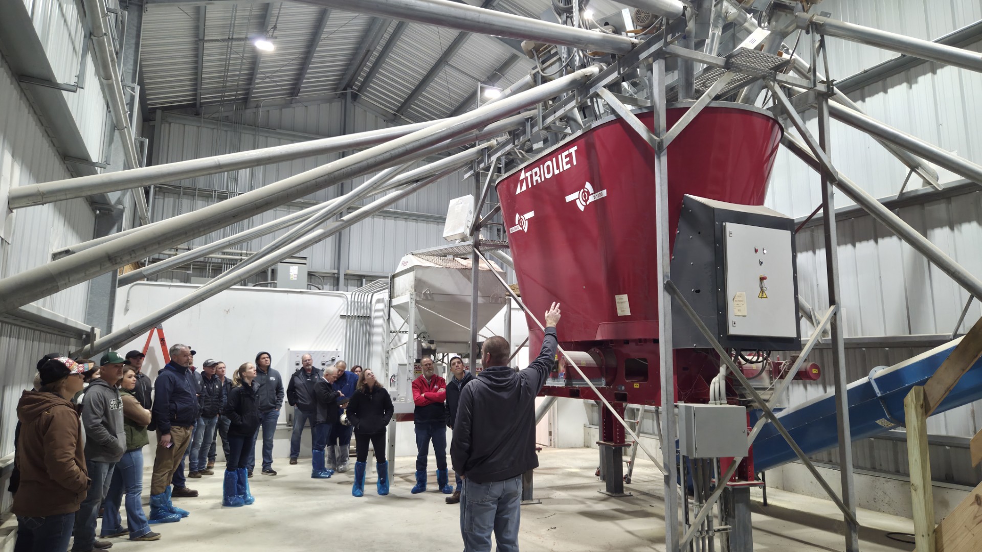 Participants of the Tri-State Dairy Conference tour the feed center of Homestead Dairy.