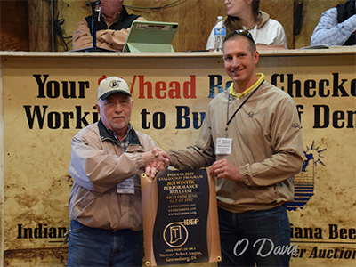 Award presented to Andrew Stewart, Stewart Select Angus, by Steve Ritter