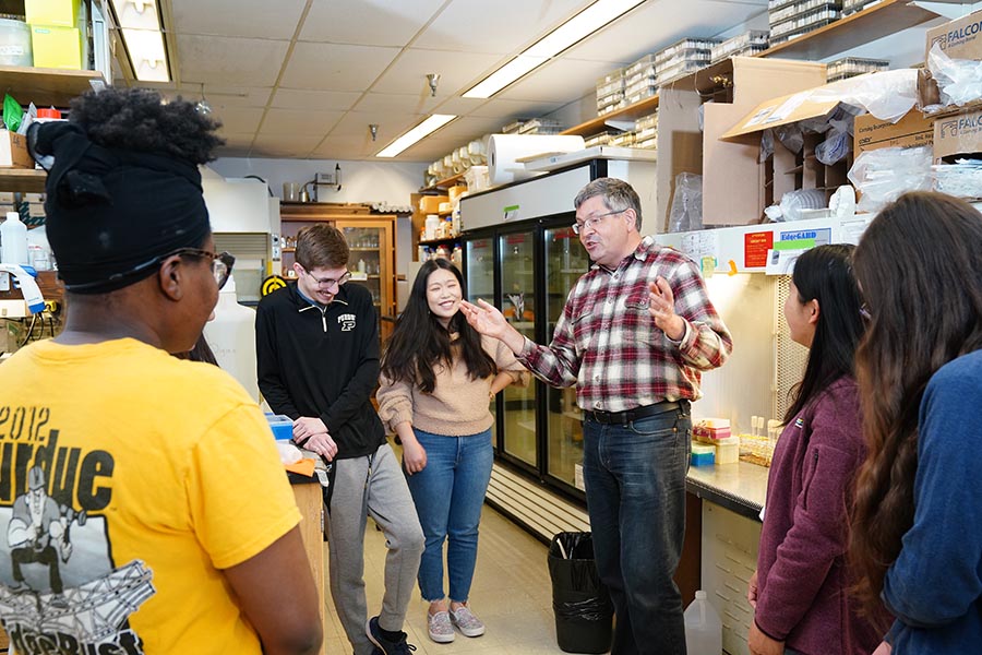 Dr. Joe Ogas with students