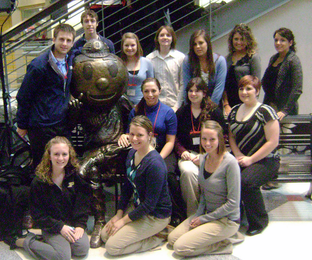 Students surround Brutus Buckeye sculpture