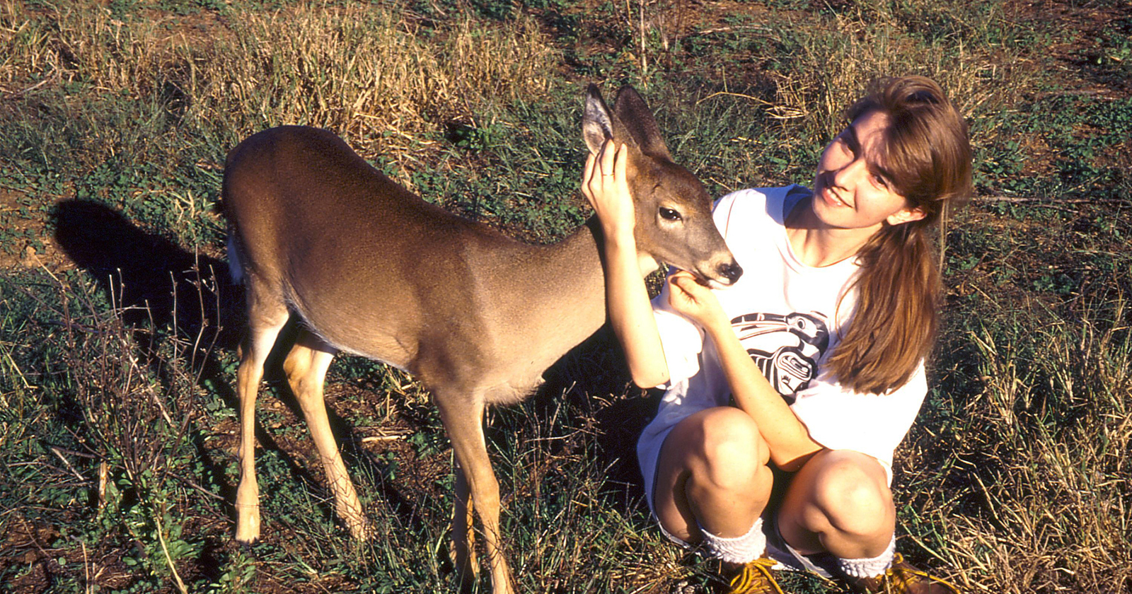 A young Eva Haviarova with a deer