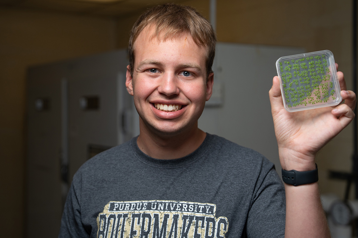 Blaine holding a petri dish