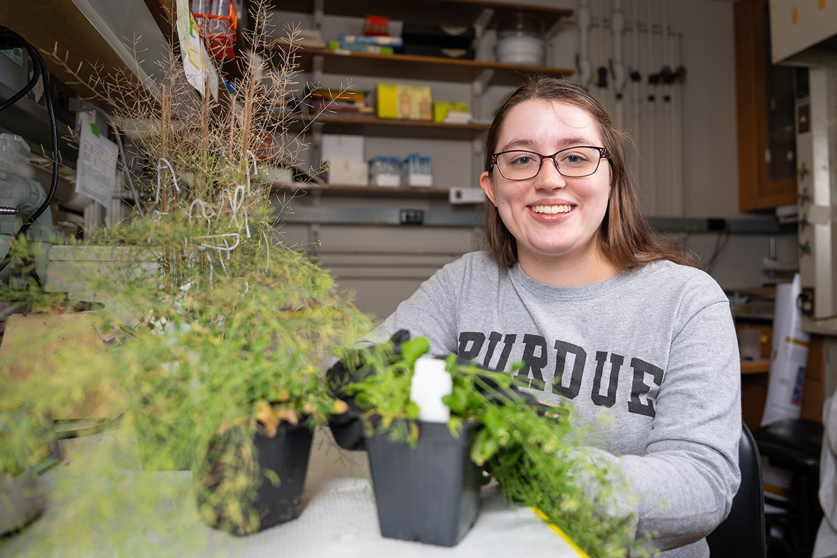 Shelby with plants